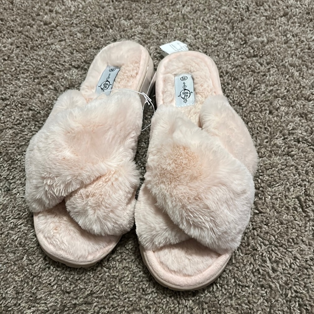 Pink fuzzy slippers